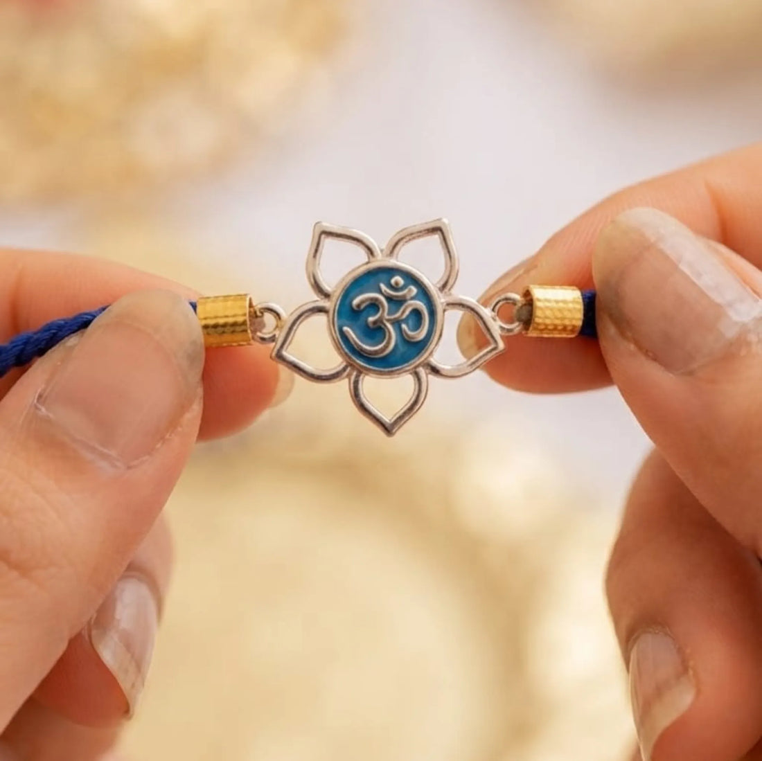 Divine Lotus Om Silver Rakhi