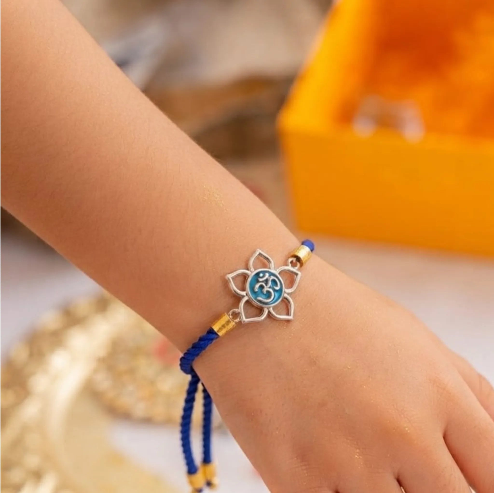 Divine Lotus Om Silver Rakhi
