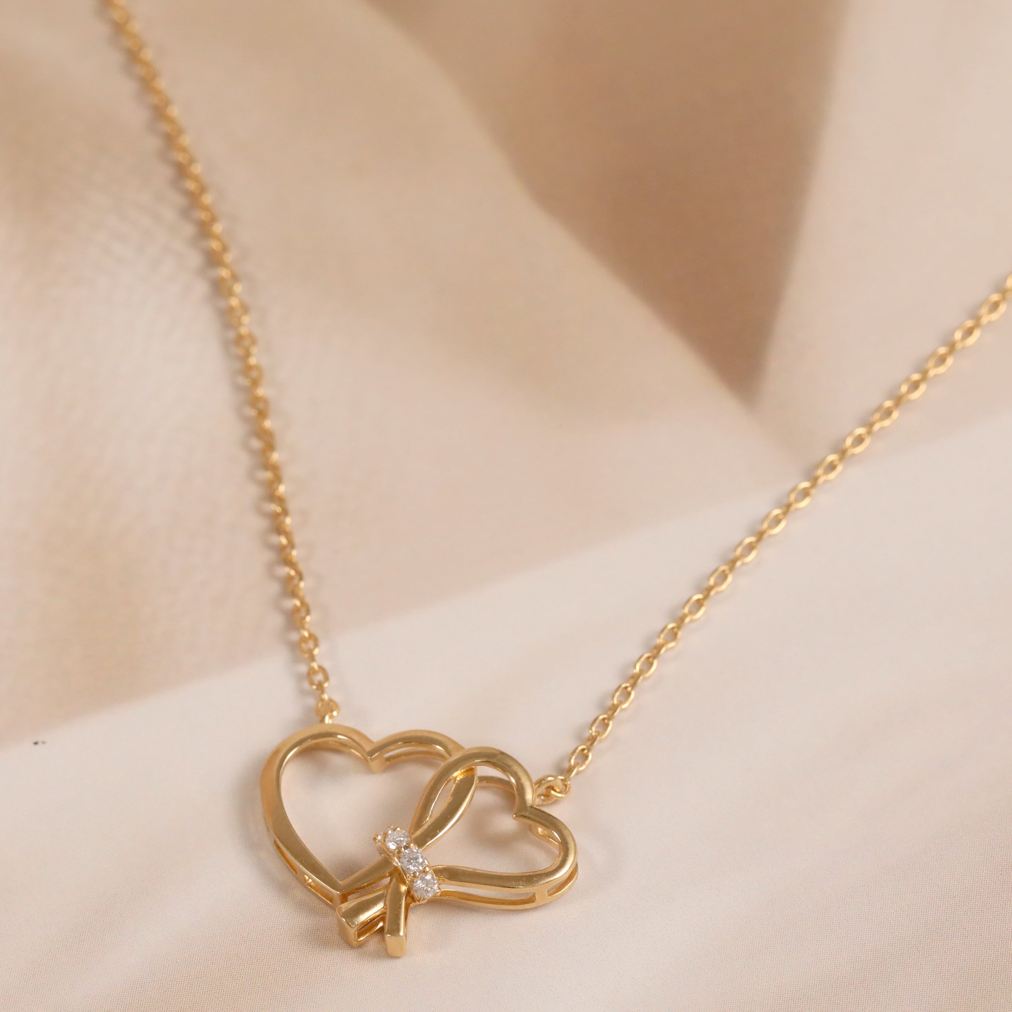 Double Heart Harmony Pendant